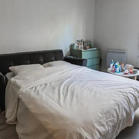 Hostnfly - Charming Studio Near Buttes-chaumont Апартаменты Париж